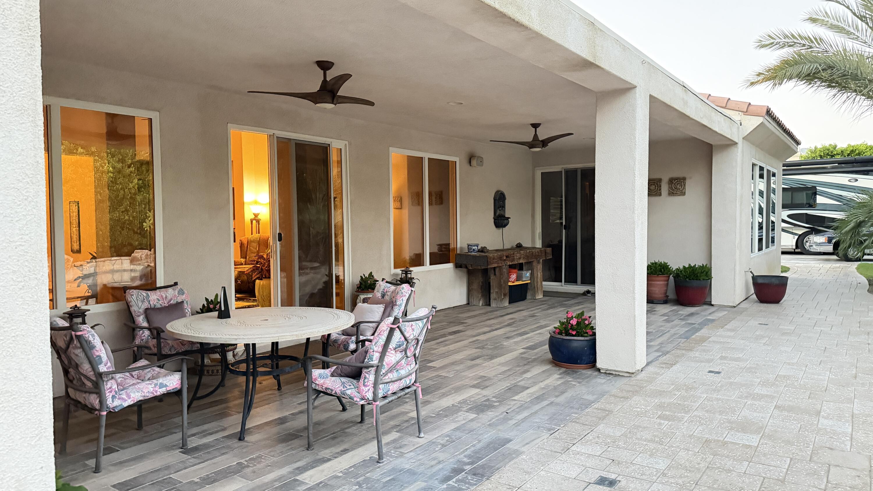 49578 Colorado Street Indio, CA 92201 - Photo 26 of 37 a view of a dining room with furniture and window