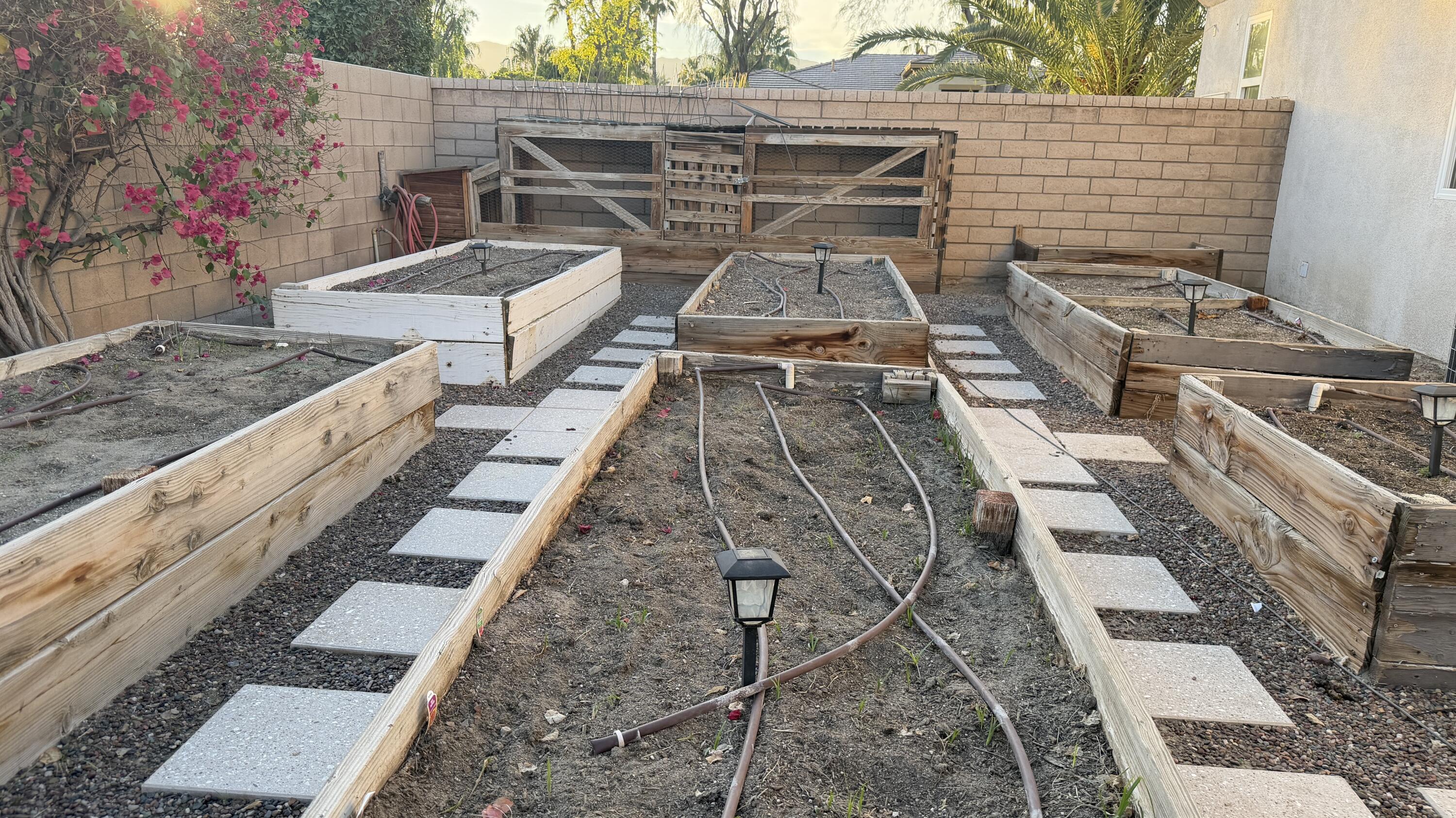 49578 Colorado Street Indio, CA 92201 - Photo 31 of 37 a terrace with outdoor seating and wooden floor