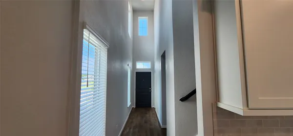 a view of a bathroom from the hallway