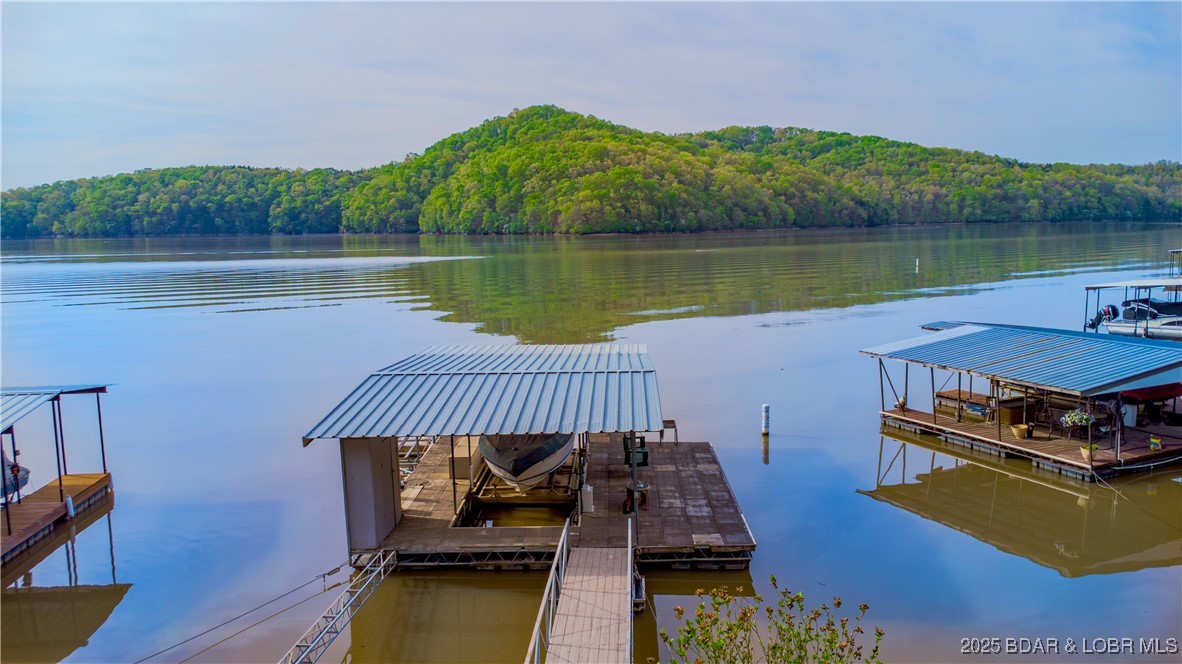 1130 Laura Hufferd Road Roach, MO 65787 - Photo 3 of 18 View from the lakeside of your home is amazing. I
