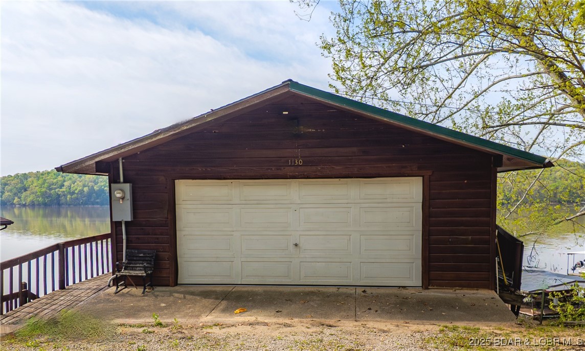 1130 Laura Hufferd Road Roach, MO 65787 - Photo 4 of 18 Two car garage.