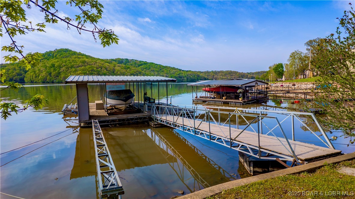 1130 Laura Hufferd Road Roach, MO 65787 - Photo 7 of 18 One well dock with large swim platform.