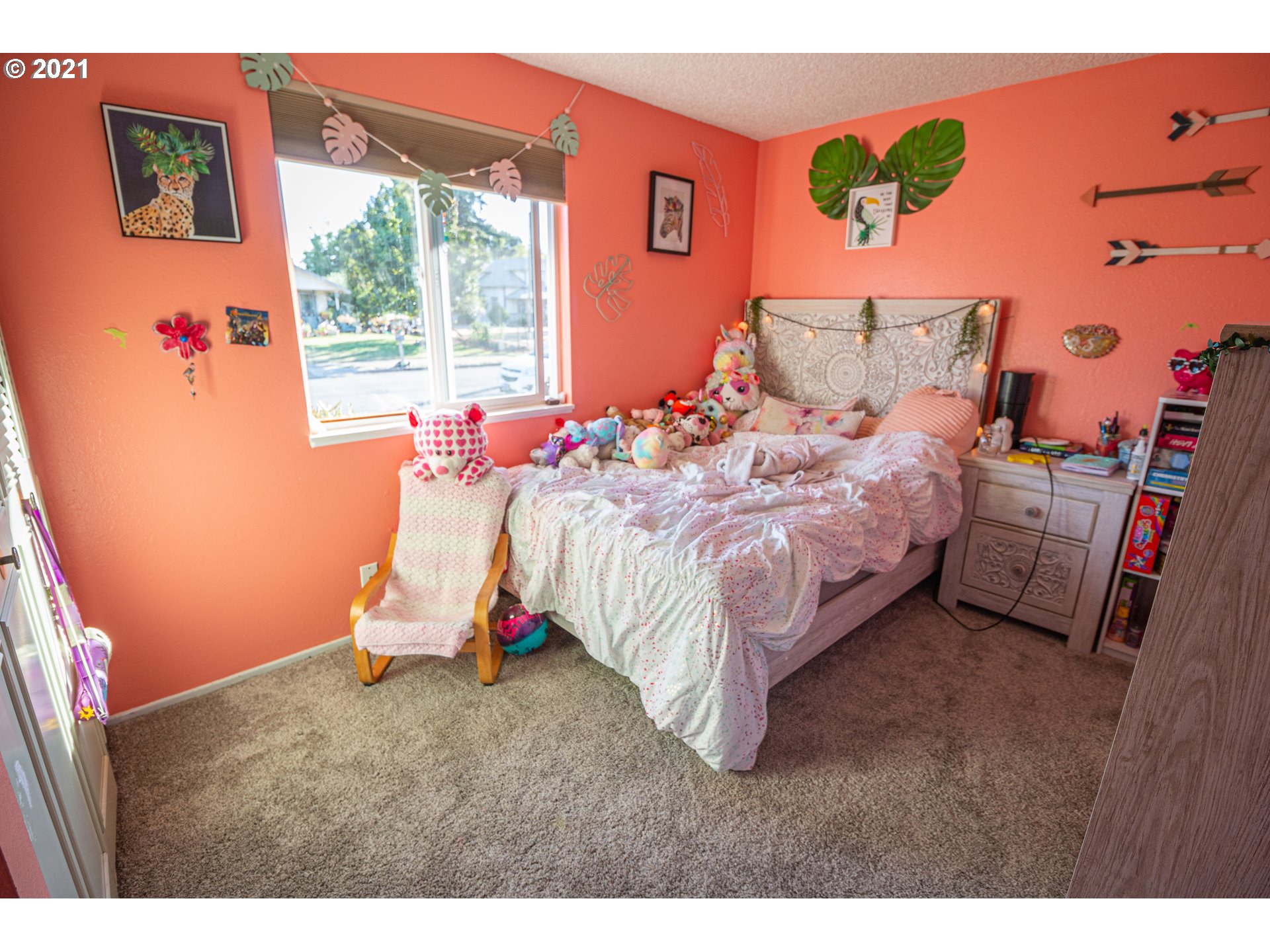 5206 F Street Springfield, OR 97478 - Photo 14 of 17 a bedroom with a bed and a window