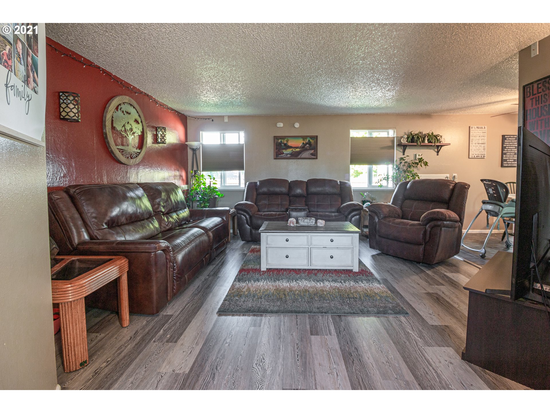 5206 F Street Springfield, OR 97478 - Photo 4 of 17 a living room with furniture and a wooden floor