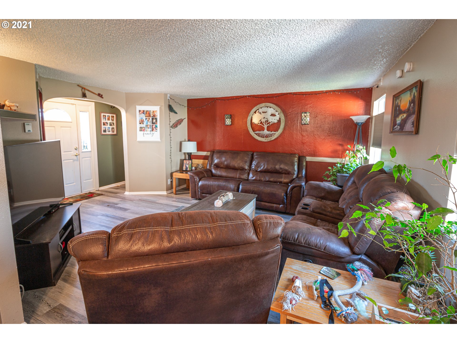 5206 F Street Springfield, OR 97478 - Photo 5 of 17 a bed room with a bed mirror and a chair