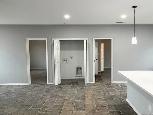 a bathroom with a sink and a shower