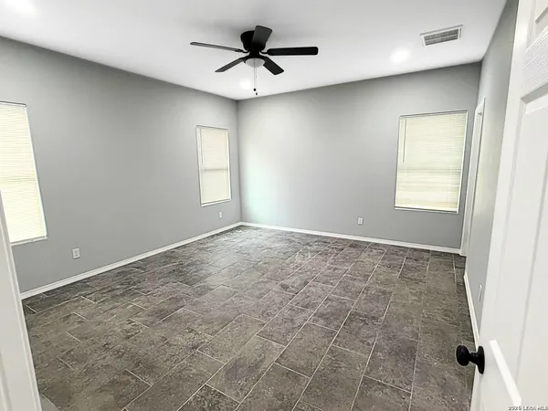 a view of an empty room and window