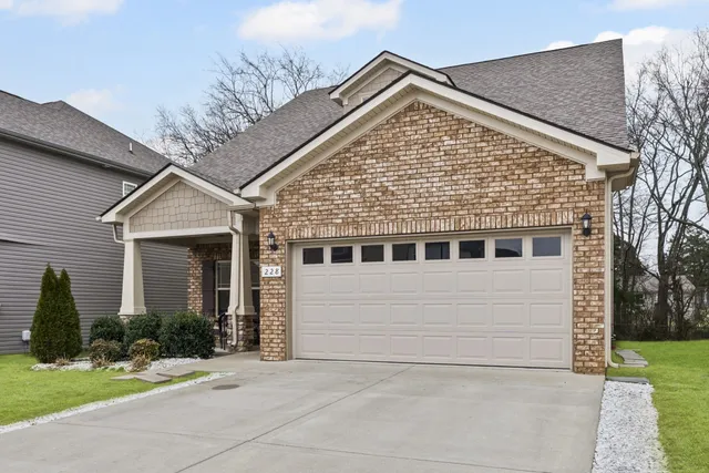 a view of house with yard