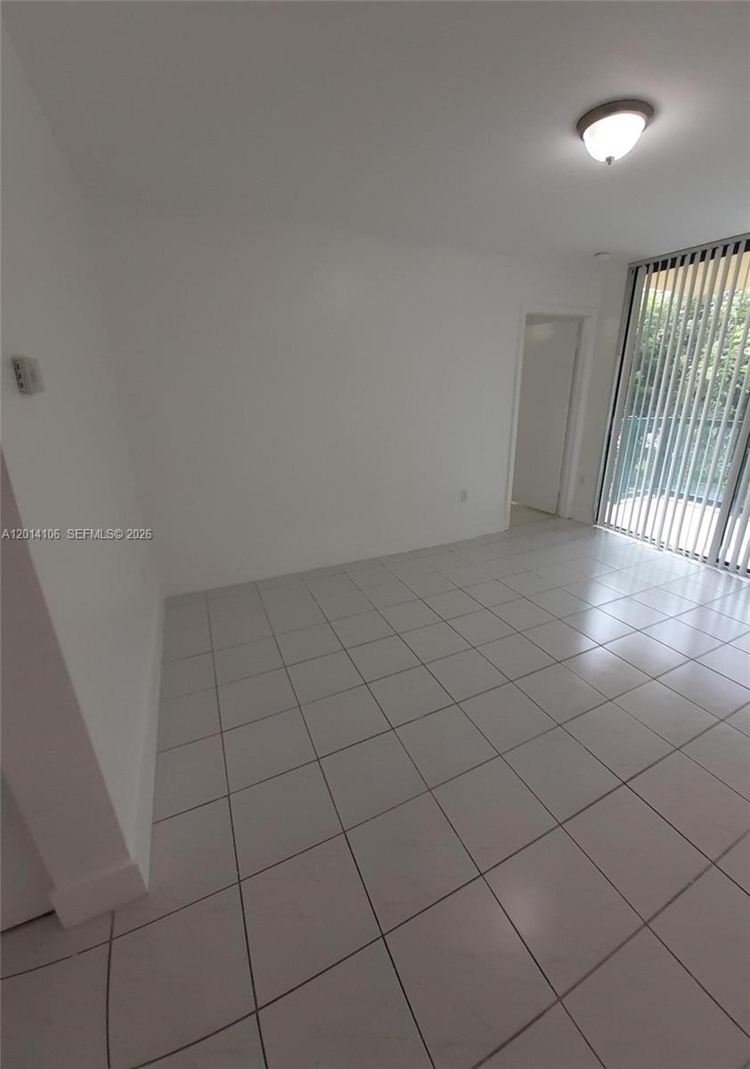 11800 Southwest 18th Street, Unit 3144 Miami, FL 33175 - Photo 11 of 23 a view of an empty room and staircase