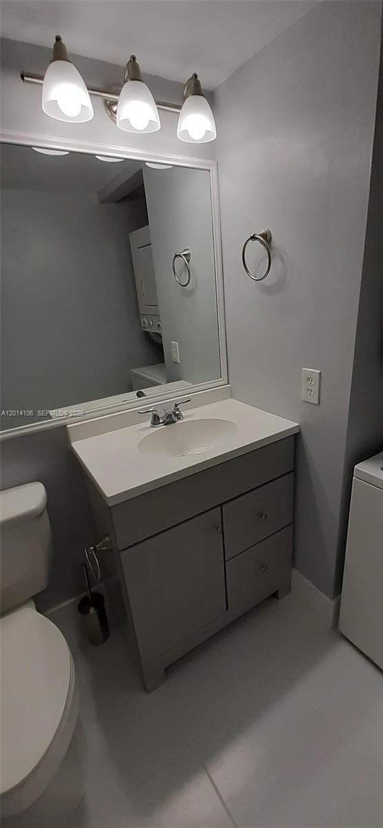 11800 Southwest 18th Street, Unit 3144 Miami, FL 33175 - Photo 13 of 23 a bathroom with a sink mirror and toilet