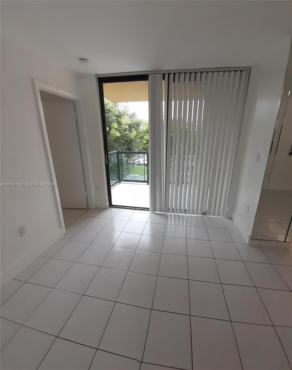 11800 Southwest 18th Street, Unit 3144 Miami, FL 33175 - Photo 10 of 23 a view of an empty room and a window