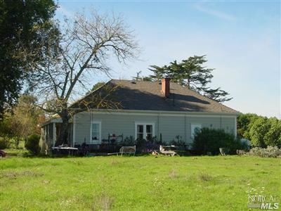 10660 Barnett Valley Road Sebastopol, CA 95472 - Photo 6 of 10 a front view of a house with a garden and yard
