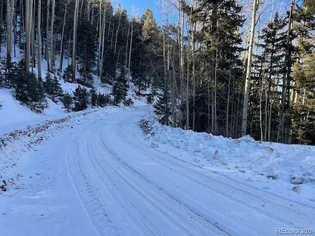 a view of a backyard of the house