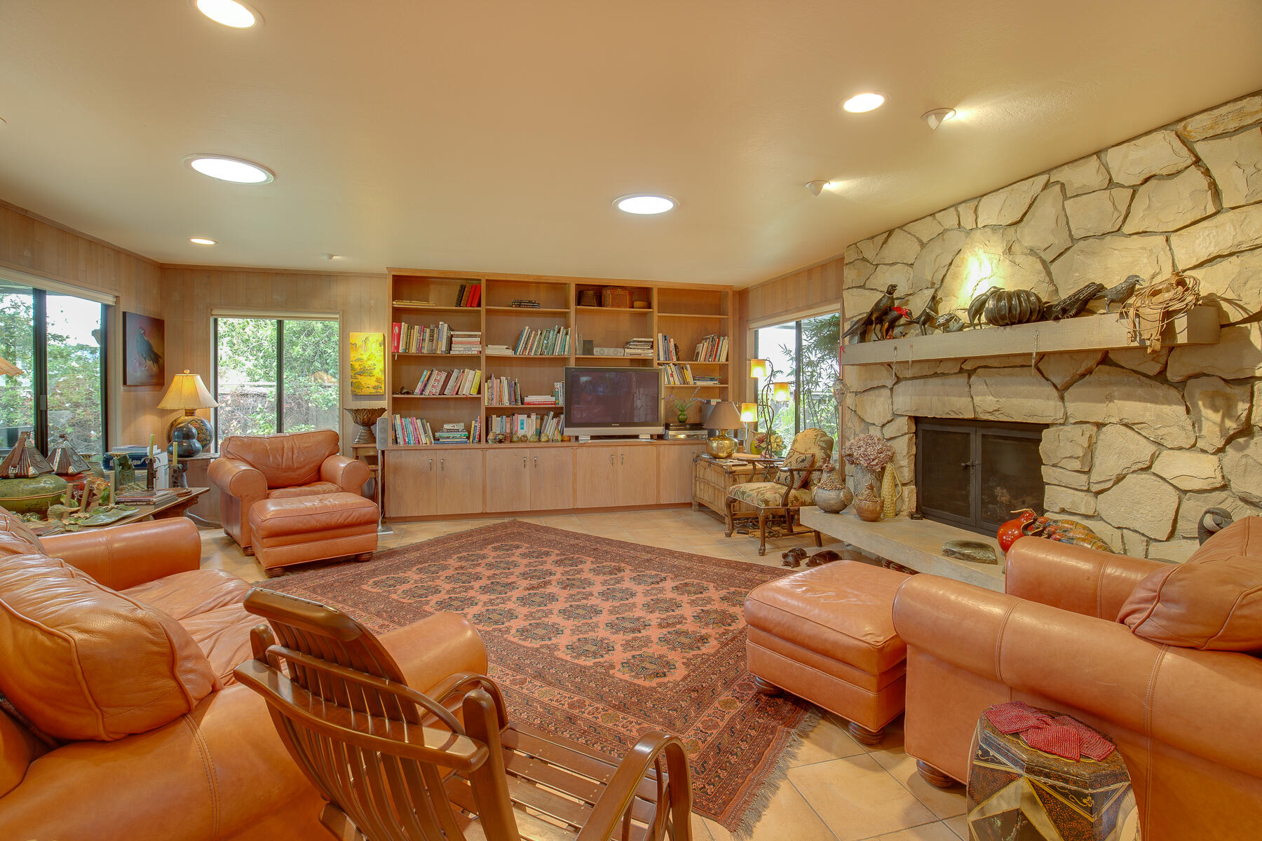 137 3rd Street Solvang, CA 93463 - Photo 4 of 24 a bedroom with furniture and a fireplace