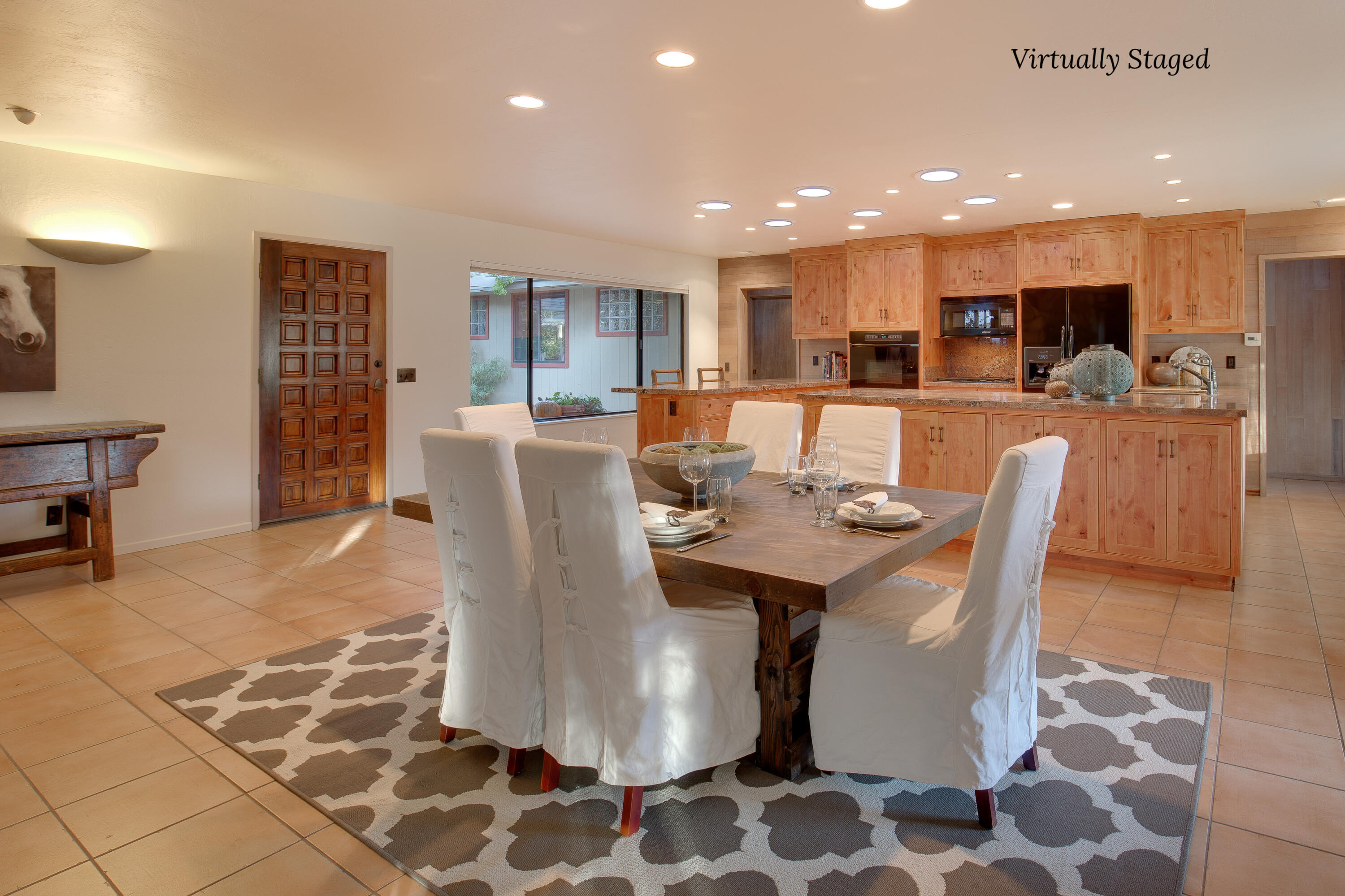 137 3rd Street Solvang, CA 93463 - Photo 9 of 24 a dining room with a table and chairs