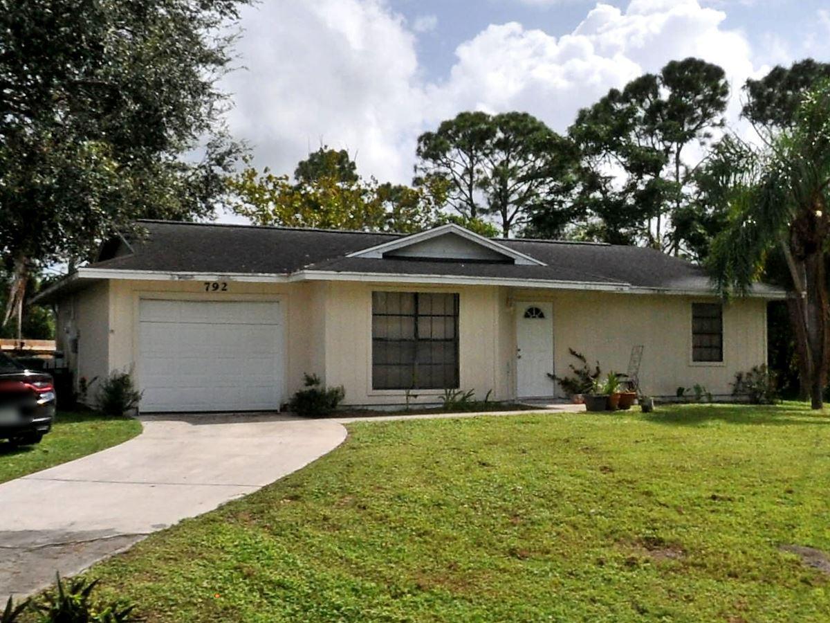 792 Southwest Arkansas Terrace Port St. Lucie, FL 34953 - Photo 6 of 6 792 SW Arkansas Terrace Front
