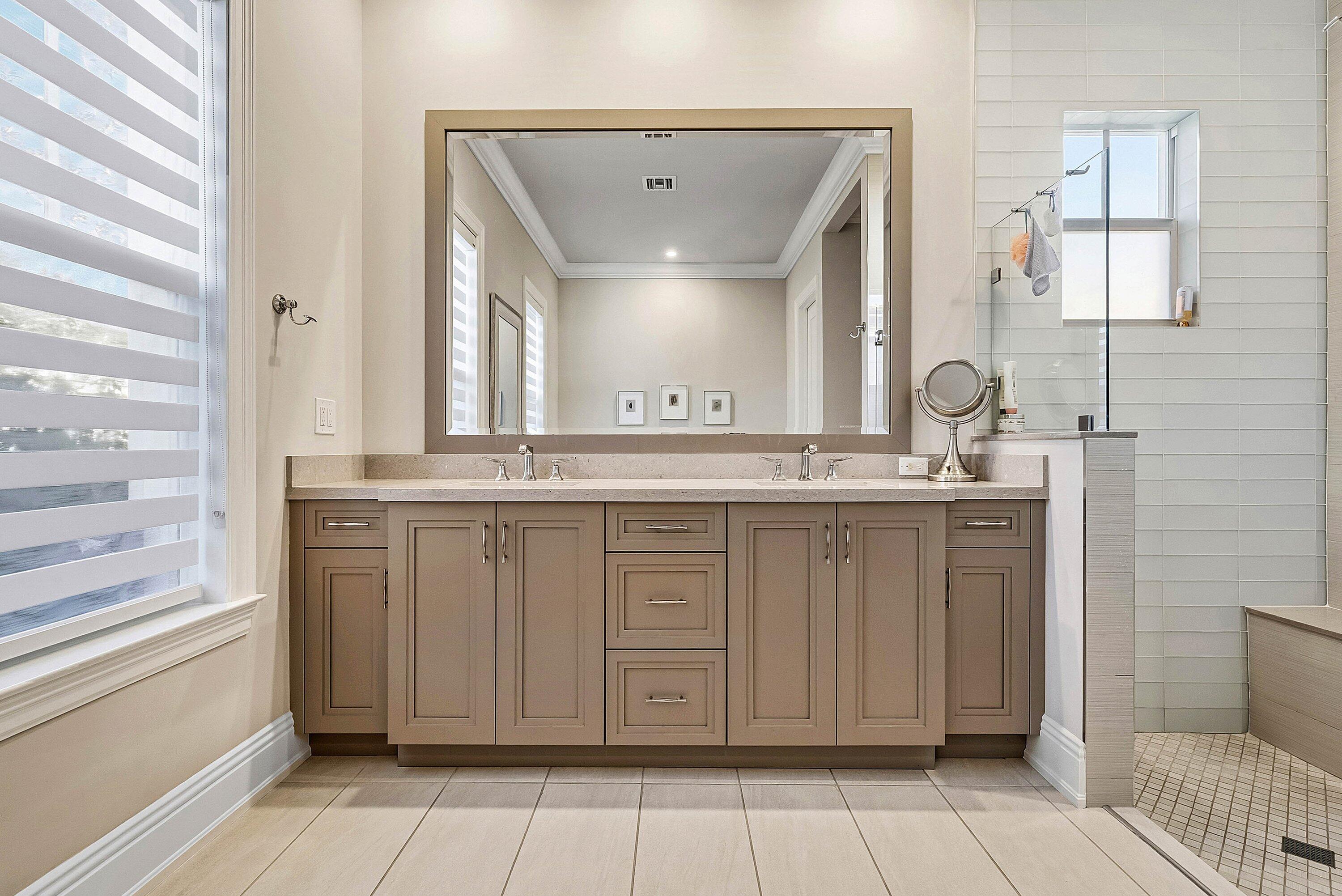 120 Grove Way Delray Beach, FL 33444 - Photo 21 of 43 a bathroom with a granite countertop sink a mirror and a vanity