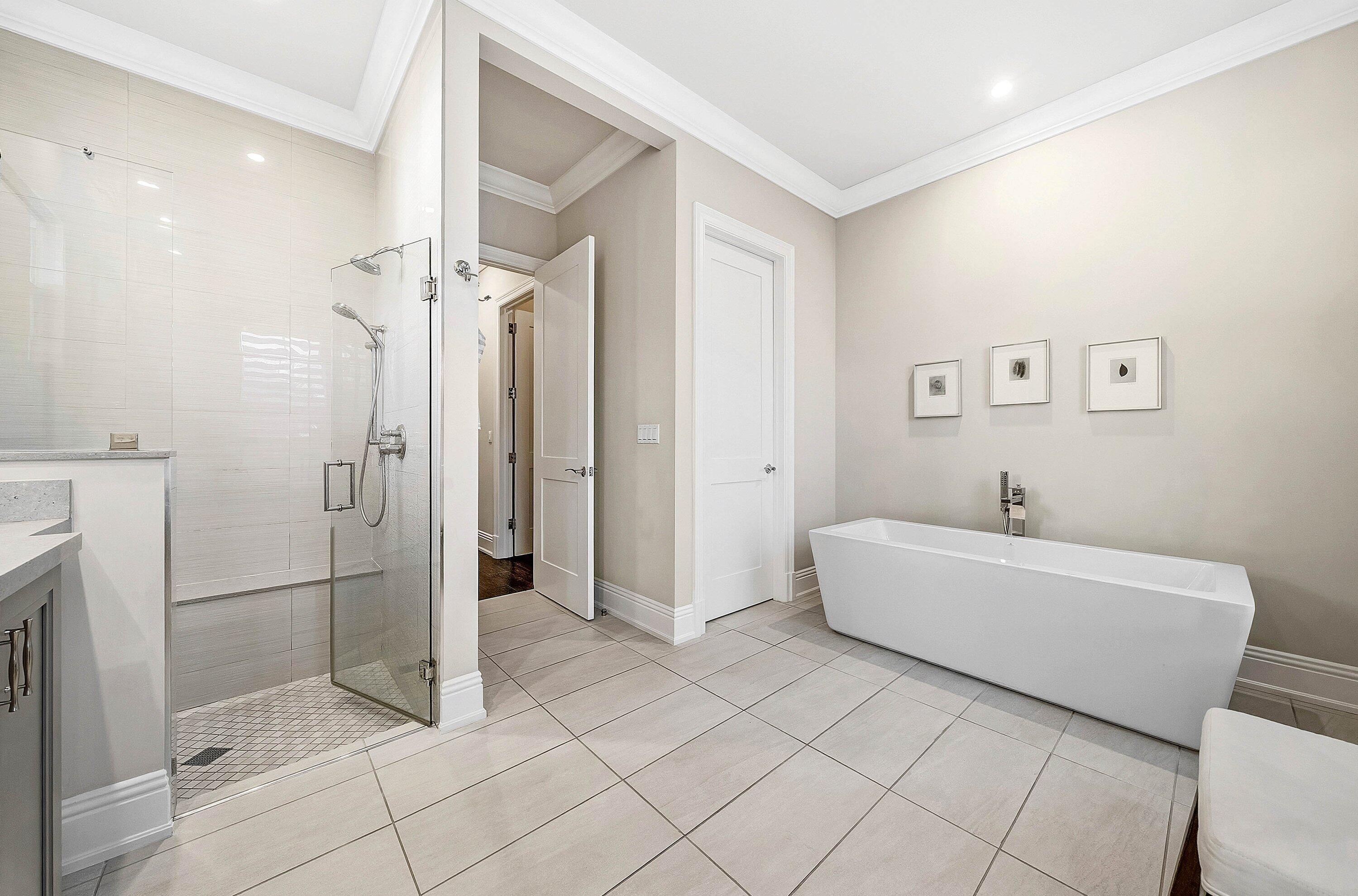 120 Grove Way Delray Beach, FL 33444 - Photo 22 of 43 a bathroom with a bathtub and a shower