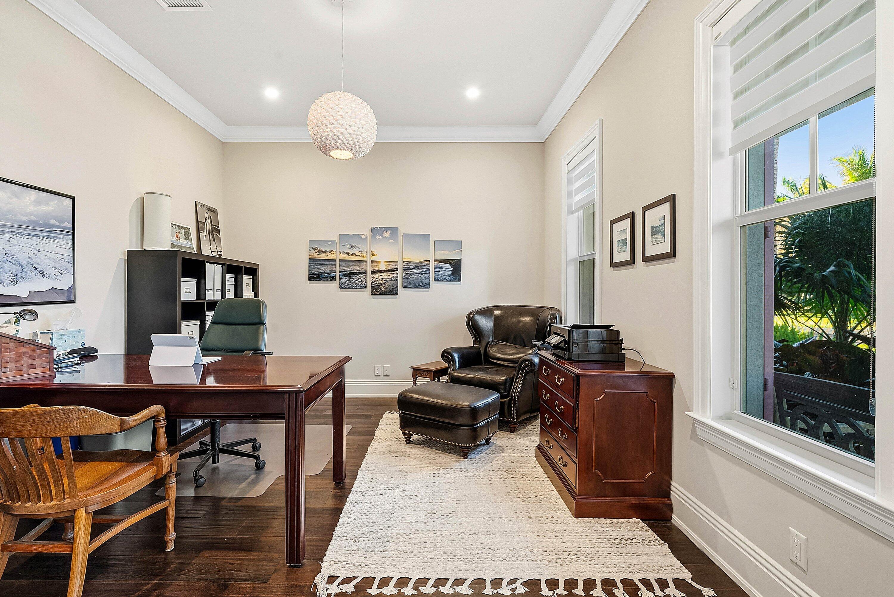 120 Grove Way Delray Beach, FL 33444 - Photo 24 of 43 a living room with furniture a flat screen tv and a window