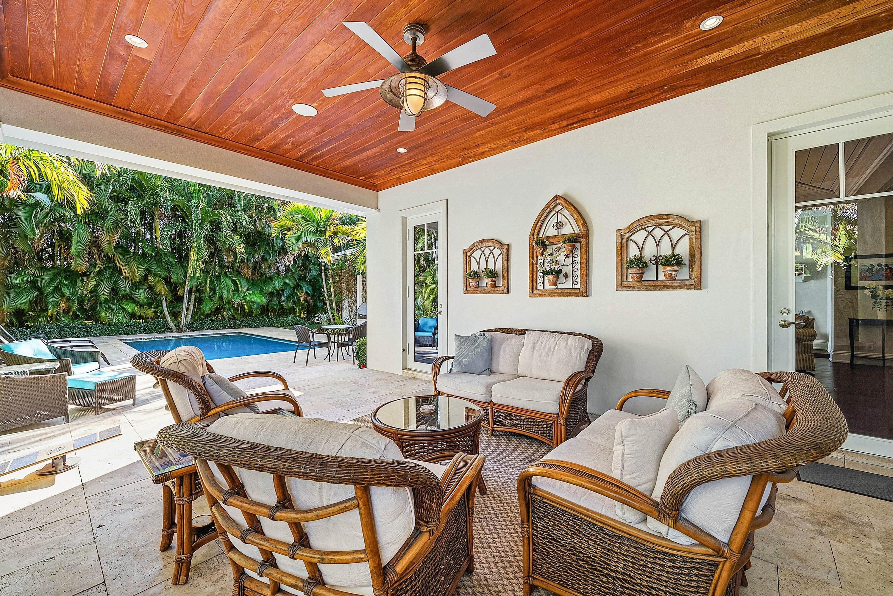 120 Grove Way Delray Beach, FL 33444 - Photo 37 of 43 a view of a chairs and table in patio with a backyard