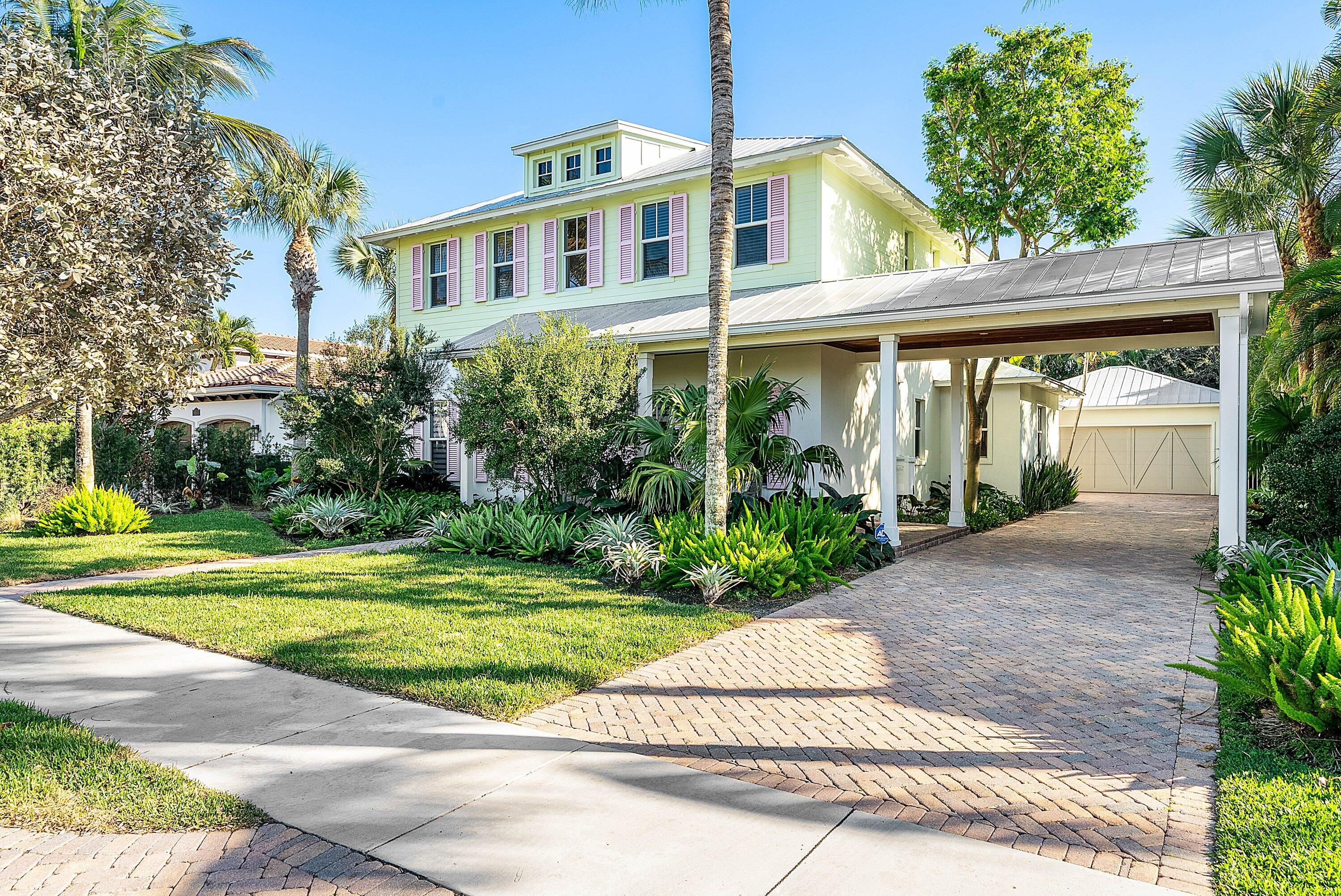 120 Grove Way Delray Beach, FL 33444 - Photo 40 of 43 a front view of a house with garden