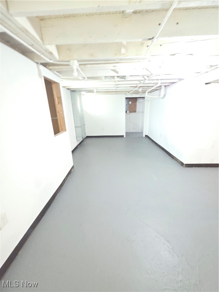 3797 Delmore Road Cleveland, OH 44121 - Photo 15 of 39 Basement featuring baseboards