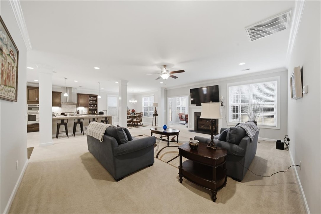 324 Crestgate Way Easley, SC 29642 - Photo 14 of 44 This inviting space combines comfort with an open layout, perfect for everyday living.