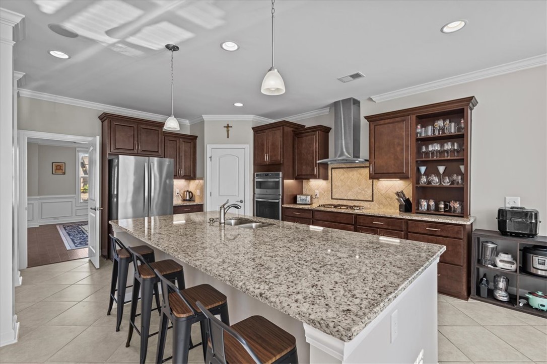 324 Crestgate Way Easley, SC 29642 - Photo 2 of 44 An inviting kitchen with a spacious island, perfect for culinary endeavors and gatherings.