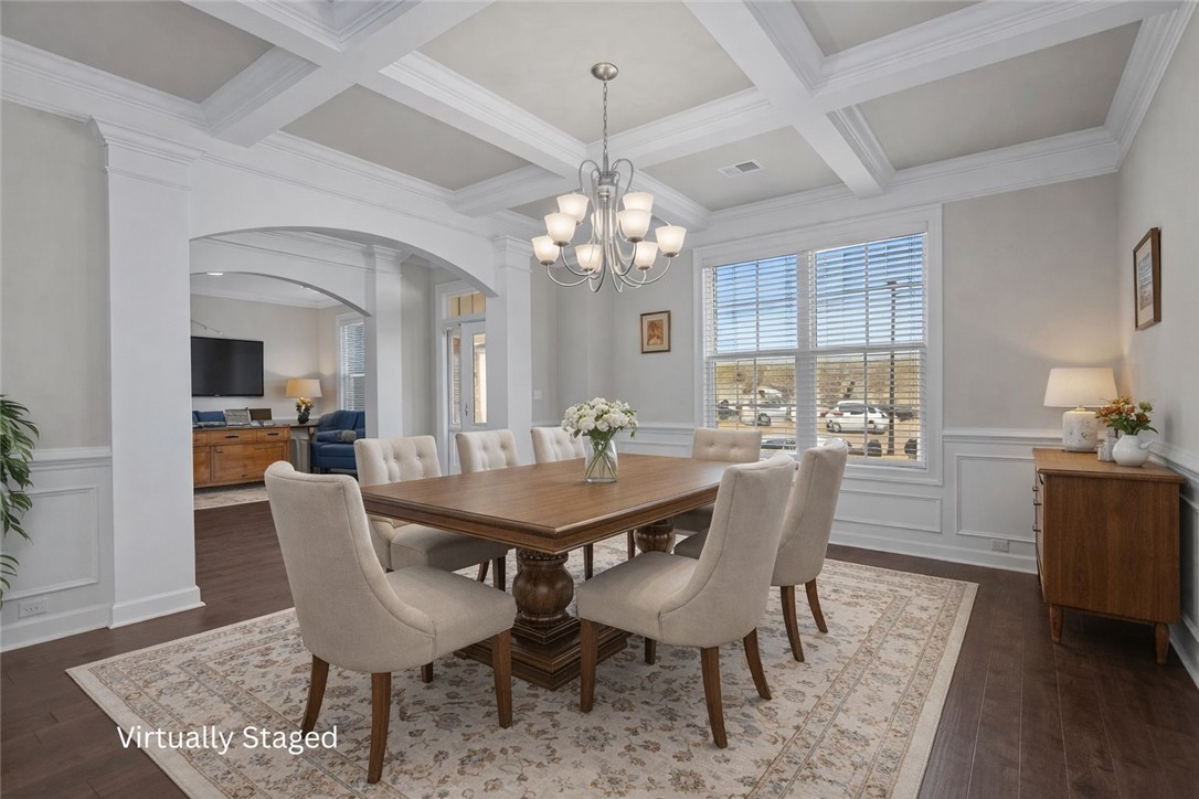 324 Crestgate Way Easley, SC 29642 - Photo 5 of 44 This dining room is thoughtfully designed for gatherings and daily meals, offering a refined space.