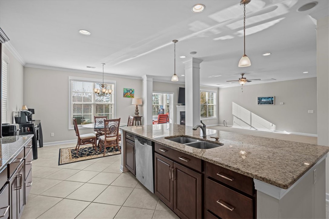324 Crestgate Way Easley, SC 29642 - Photo 8 of 44 This open concept kitchen offers functional design and elegant finishes for comfortable living.