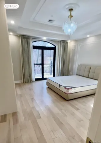 a view of a livingroom with furniture and staircase