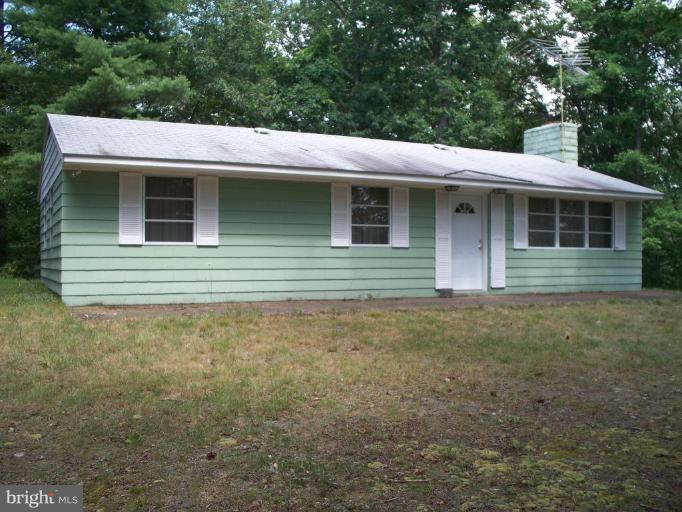 2818 Tabor Road Berkeley Springs, WV 25411 - Photo 1 of 21 a view of a house with a yard