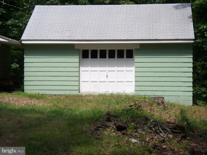 2818 Tabor Road Berkeley Springs, WV 25411 - Photo 3 of 21 a house with a outdoor space