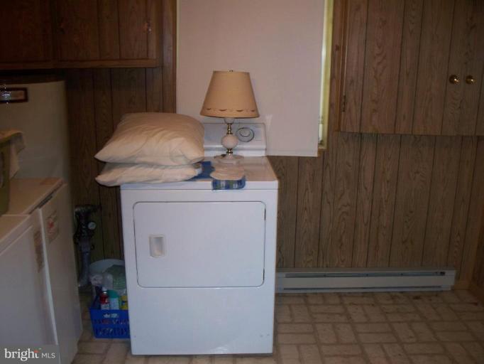 2818 Tabor Road Berkeley Springs, WV 25411 - Photo 10 of 21 a utility room with dryer and washer