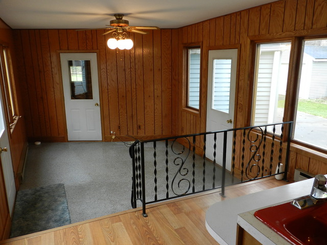 7014 East McCormick Road Stillman Valley, IL 61084 - Photo 3 of 13 a view of entryway and hall with wooden floor