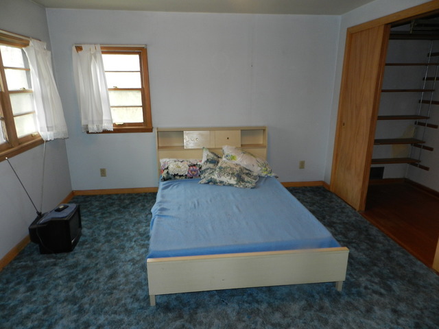 7014 East McCormick Road Stillman Valley, IL 61084 - Photo 8 of 13 a room with window and a table