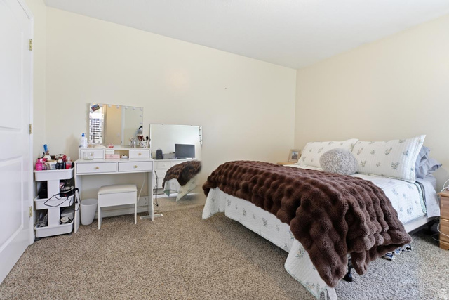 619 East 1st S Street, Unit S Preston, ID 83263 - Photo 9 of 16 Carpeted bedroom featuring light-toned walls and a white interior door