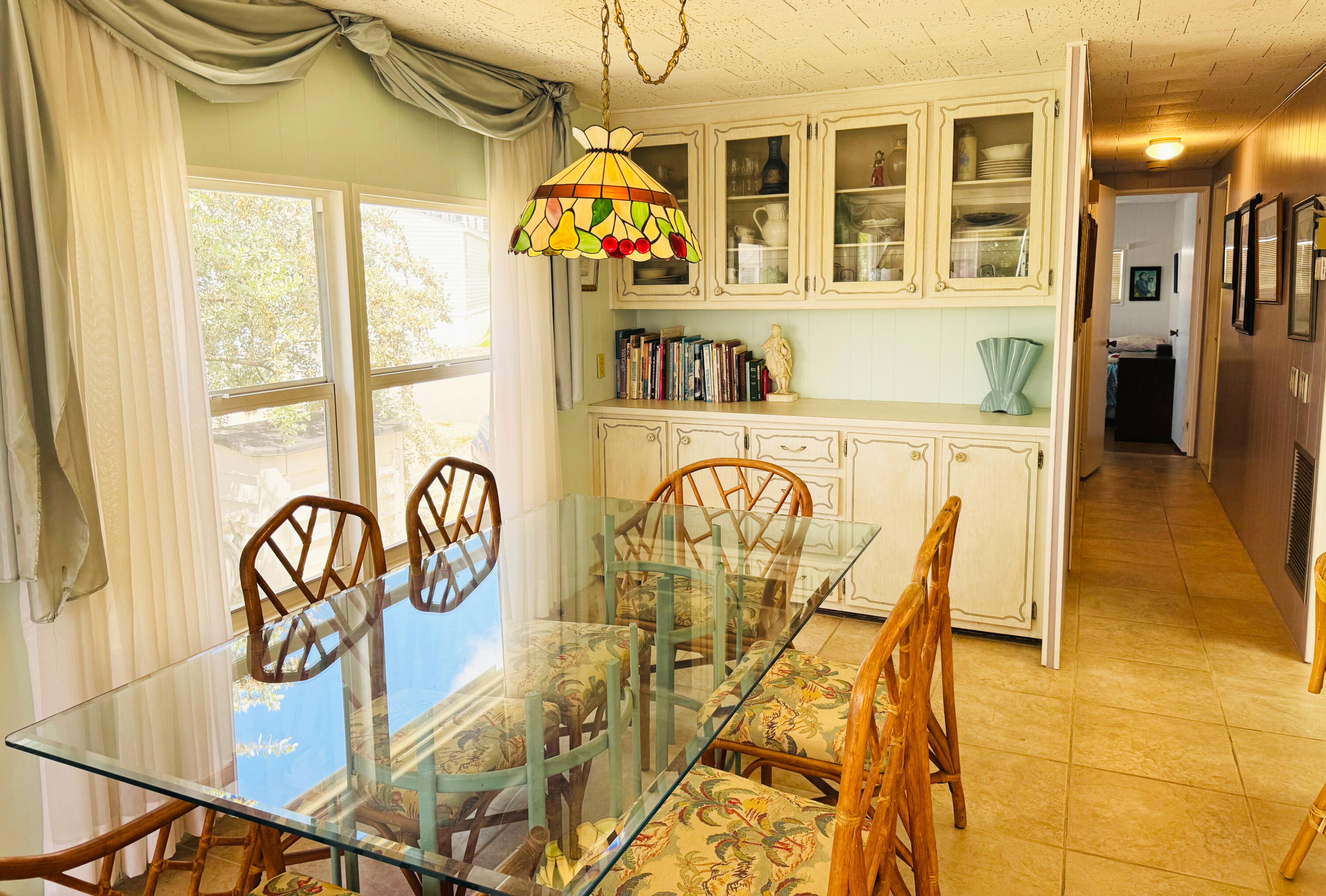 205 South Ibis Drive, Unit R Briny Breezes, FL 33435 - Photo 13 of 38 a dining table with painted walls