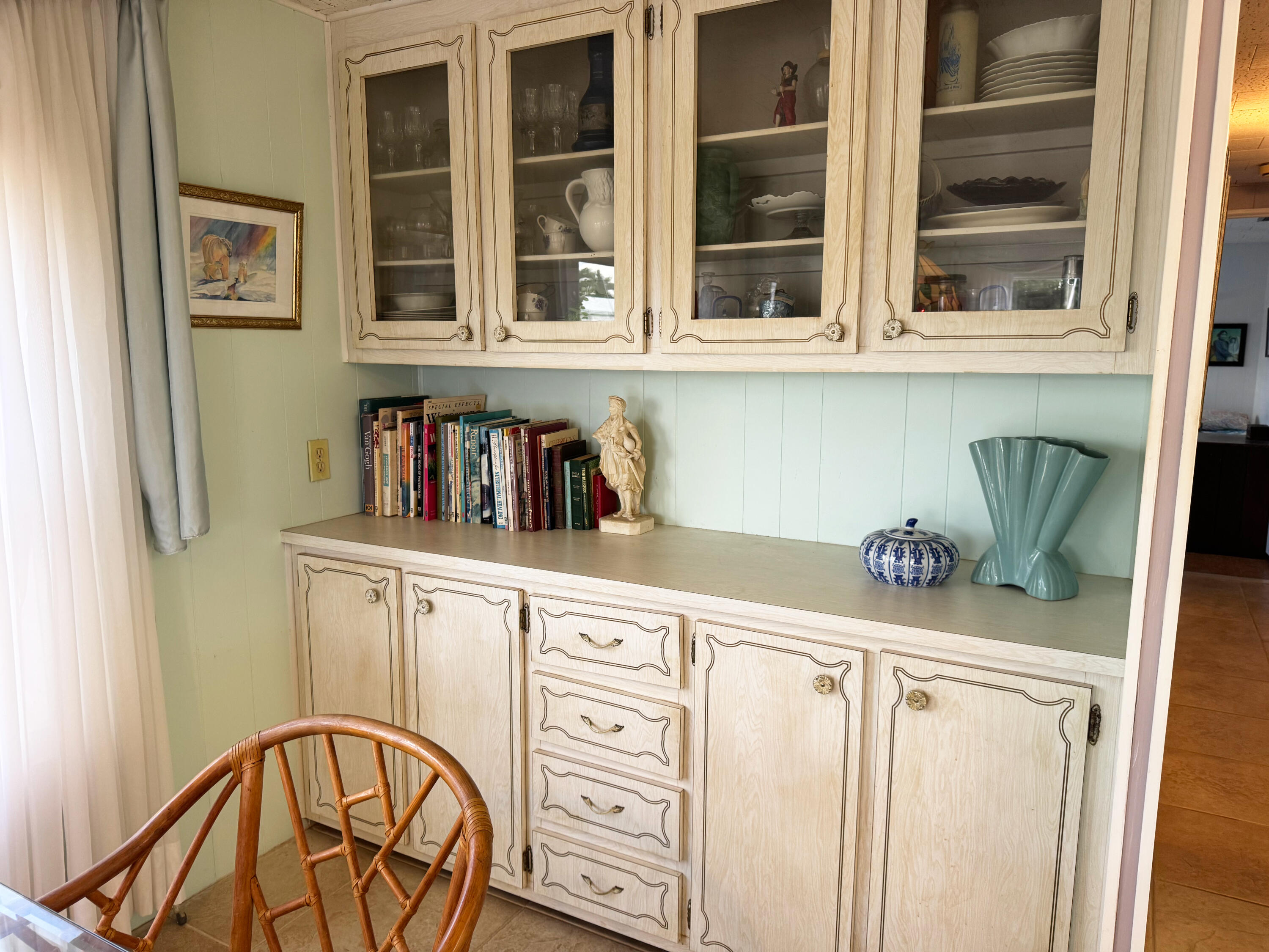205 South Ibis Drive, Unit R Briny Breezes, FL 33435 - Photo 14 of 38 a kitchen with a refrigerator and cabinets