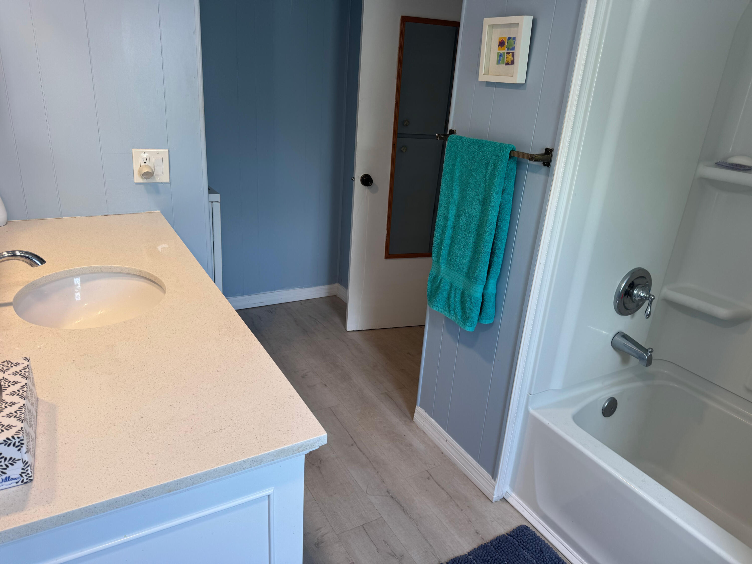 205 South Ibis Drive, Unit R Briny Breezes, FL 33435 - Photo 26 of 38 a bathroom with a tub a sink and a shower