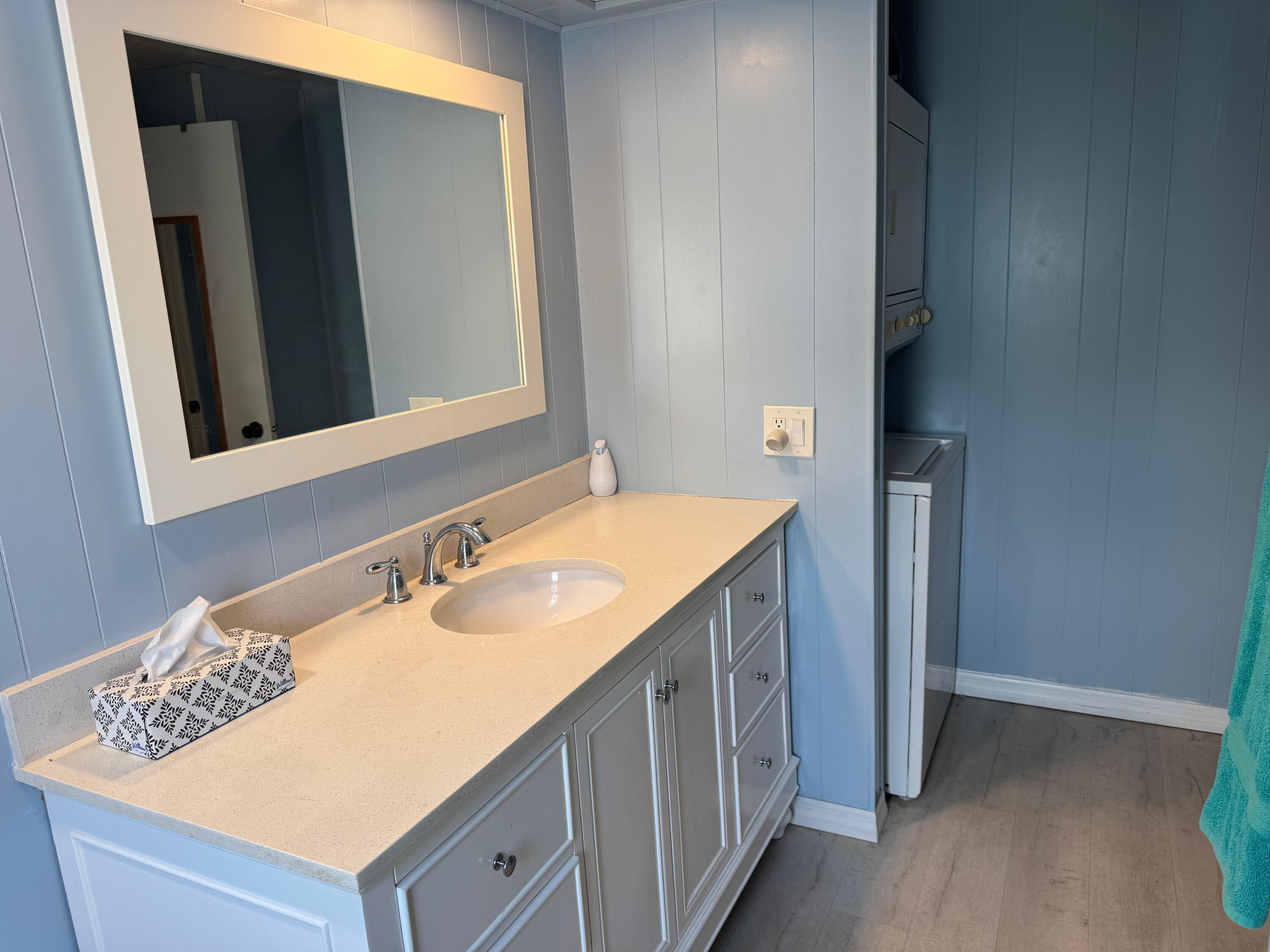 205 South Ibis Drive, Unit R Briny Breezes, FL 33435 - Photo 27 of 38 a bathroom with a sink and a mirror