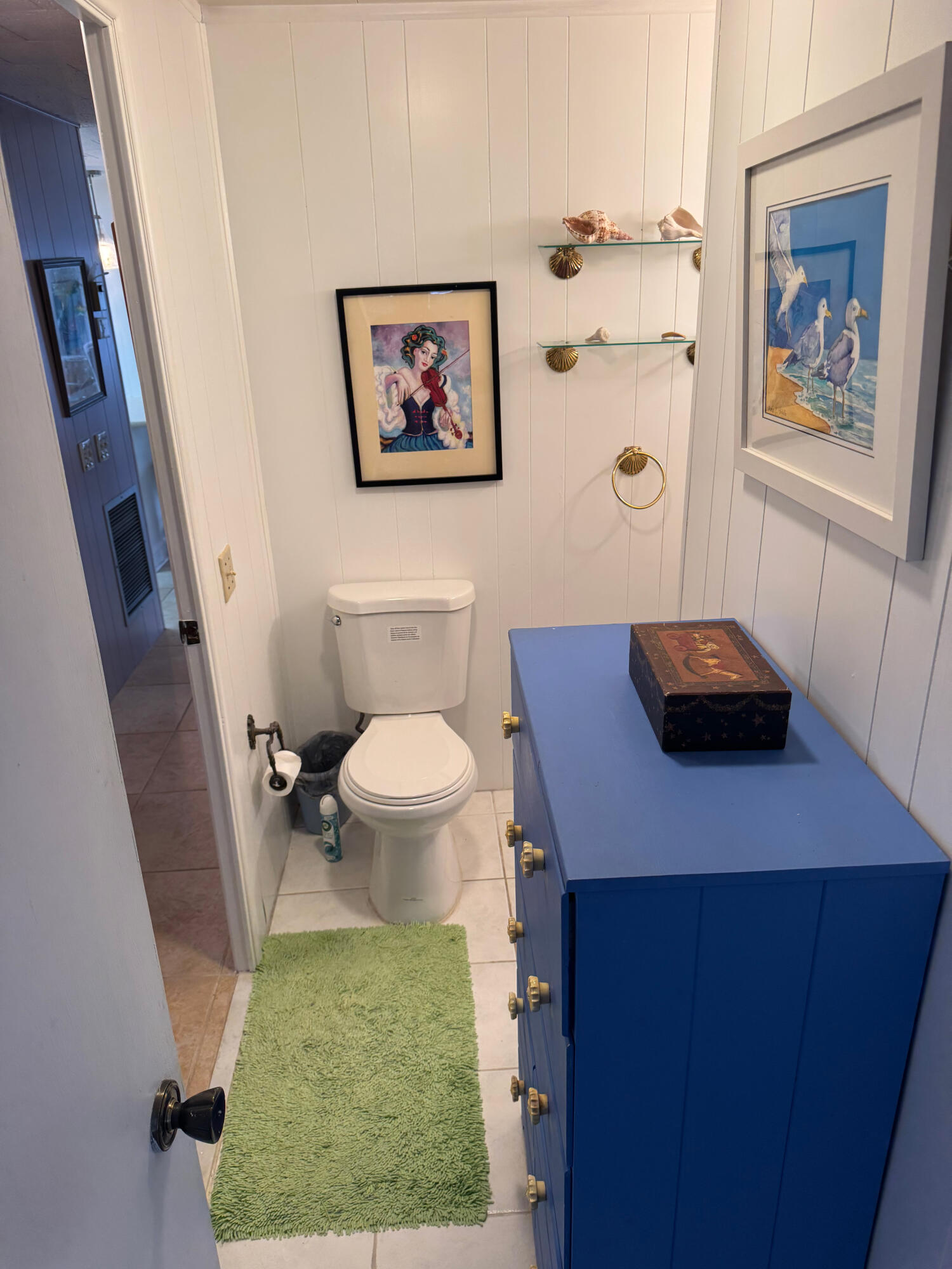 205 South Ibis Drive, Unit R Briny Breezes, FL 33435 - Photo 32 of 38 a bathroom with a toilet a sink and a mirror