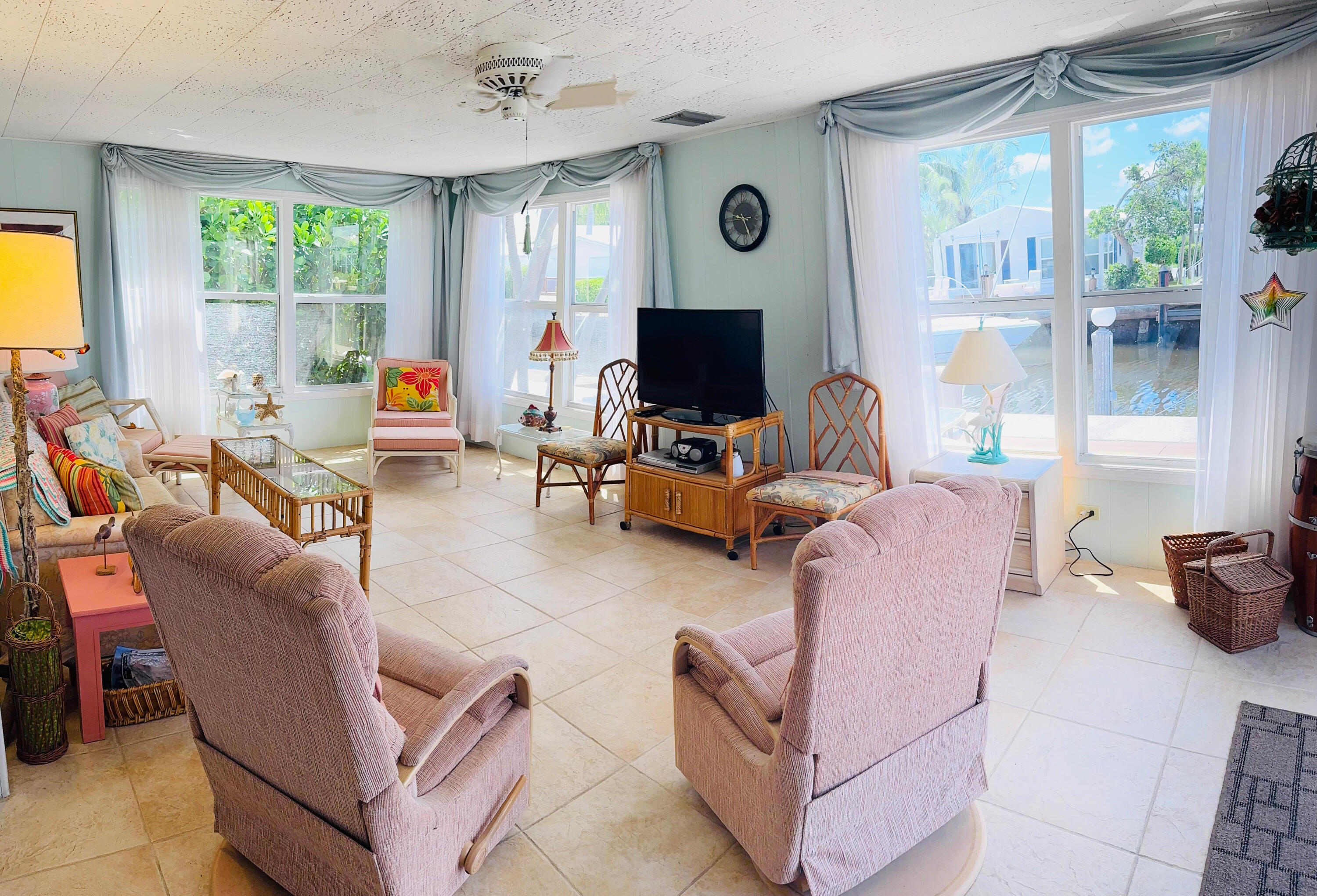 205 South Ibis Drive, Unit R Briny Breezes, FL 33435 - Photo 7 of 38 a living room filled with furniture and a large window