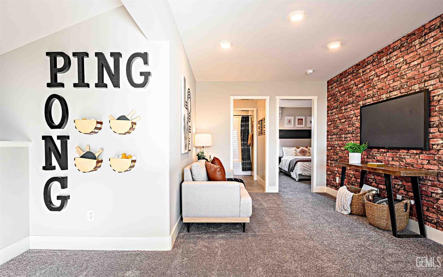 Undisclosed Address Bakersfield, CA 93313 - Photo 15 of 27 a living room with furniture and flat screen tv