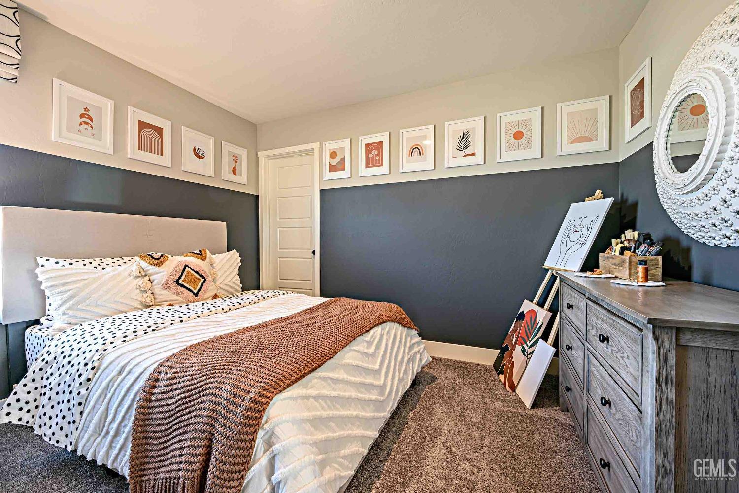 Undisclosed Address Bakersfield, CA 93313 - Photo 17 of 27 a bedroom with a bed and a window