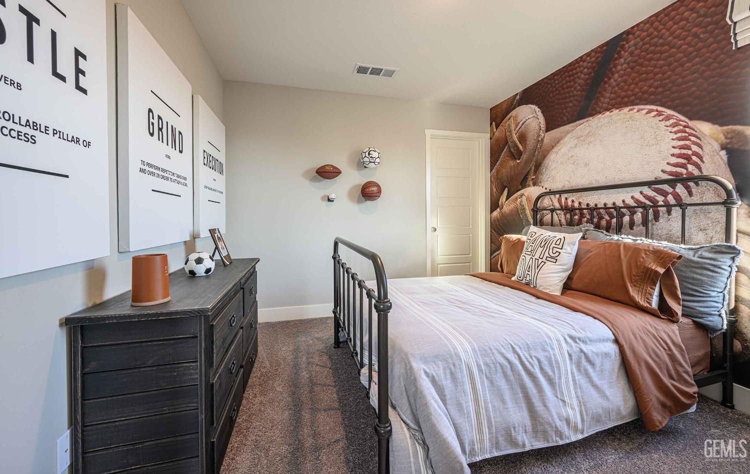 Undisclosed Address Bakersfield, CA 93313 - Photo 21 of 27 a bedroom with a bed and with furniture