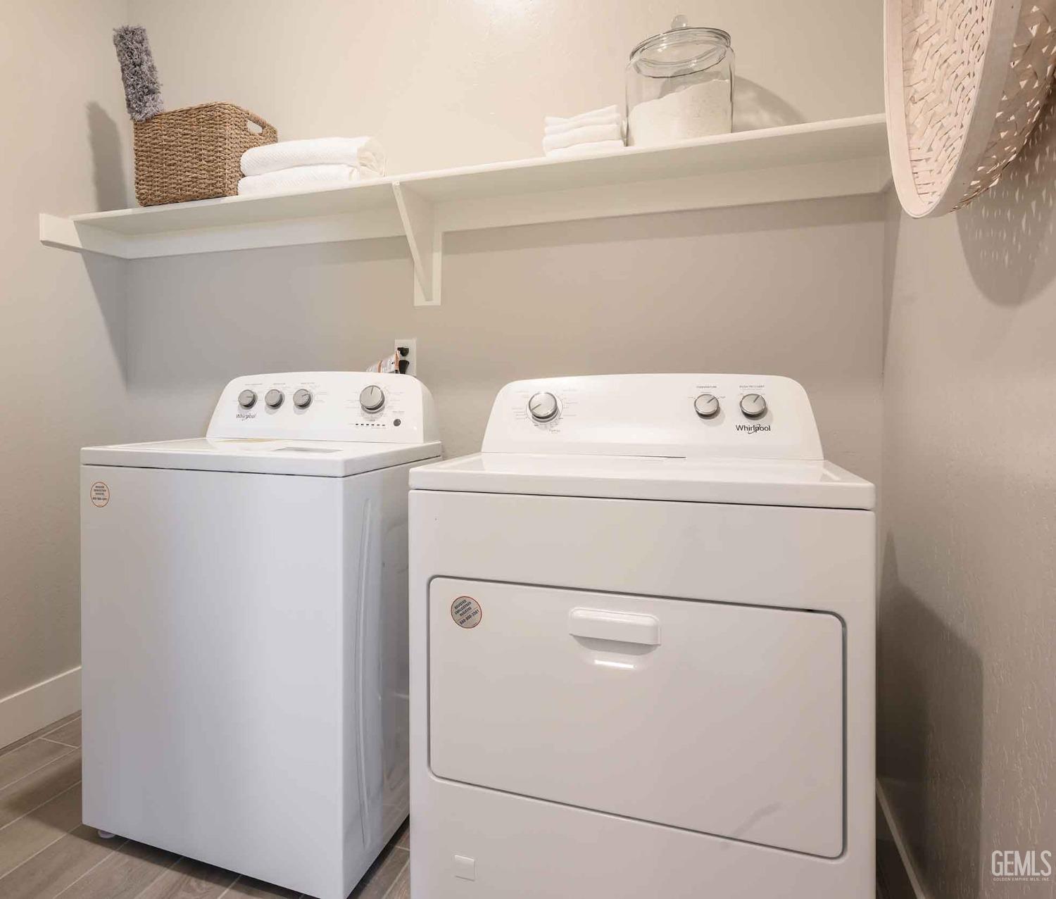 Undisclosed Address Bakersfield, CA 93313 - Photo 25 of 27 a utility room with dryer and washer
