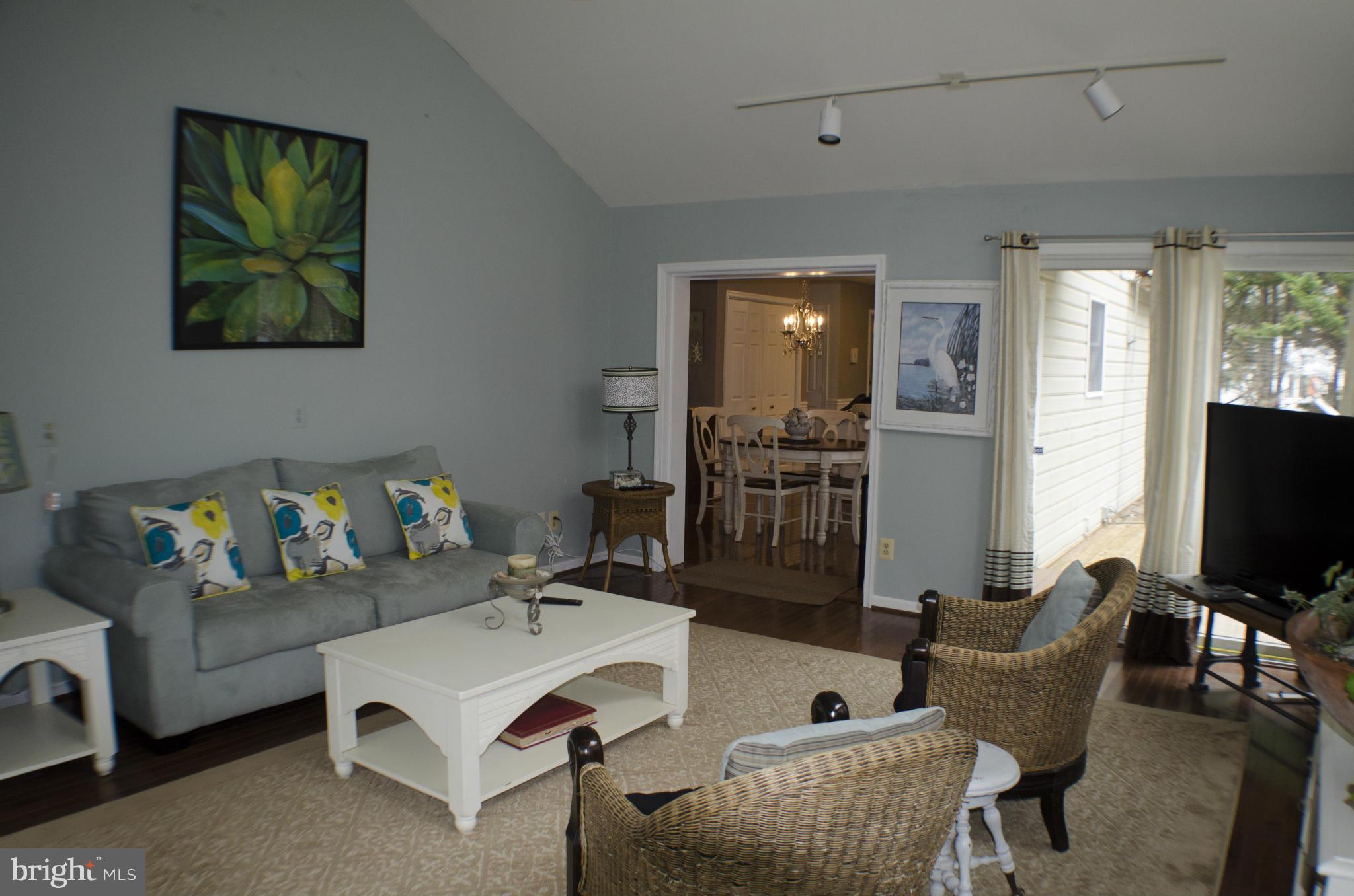 5605 Gunner Run Road Churchton, MD 20733 - Photo 8 of 30 a living room with furniture and a flat screen tv