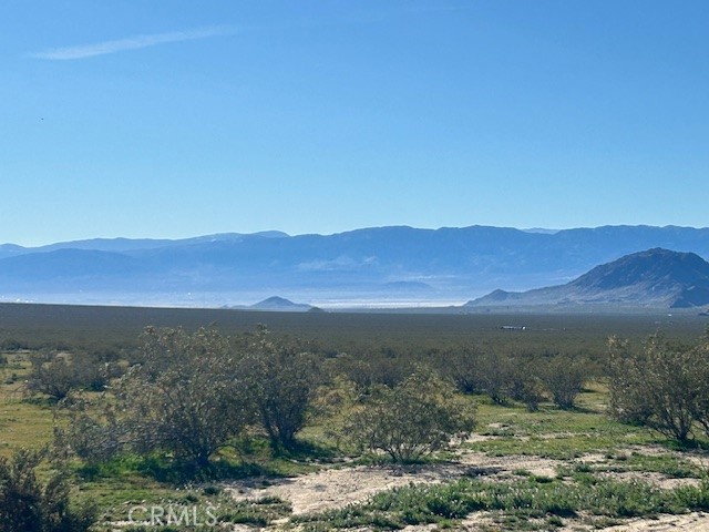 31163 Villa Nova Road Lucerne Valley, CA 92356 - Photo 20 of 25 a view of an outdoor space and mountain view