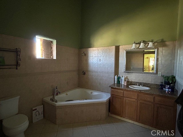 31163 Villa Nova Road Lucerne Valley, CA 92356 - Photo 7 of 25 a bathroom with a sink a toilet and mirror